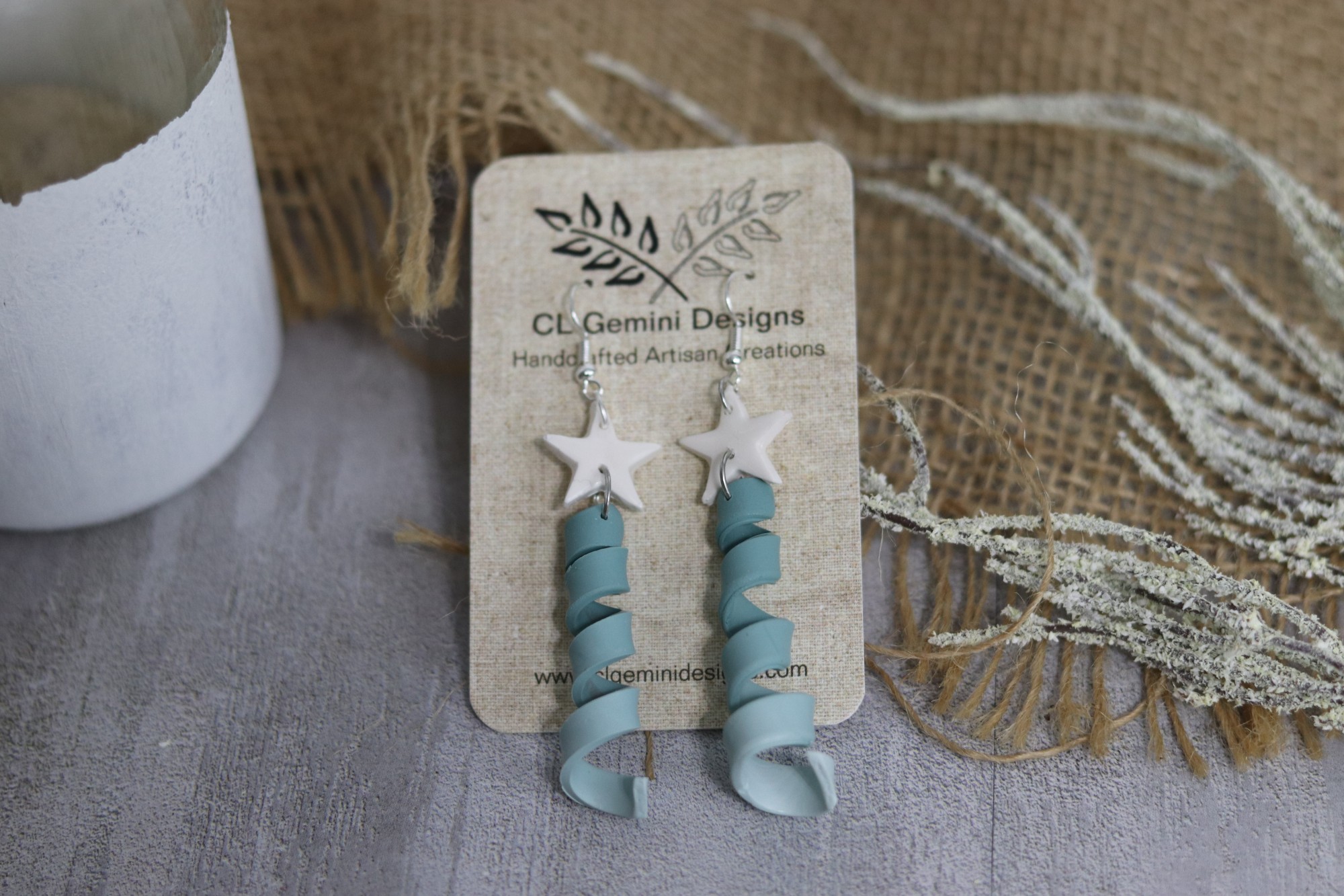 Starlit Ribbon Curls Earrings – Teal Spiral with White Star